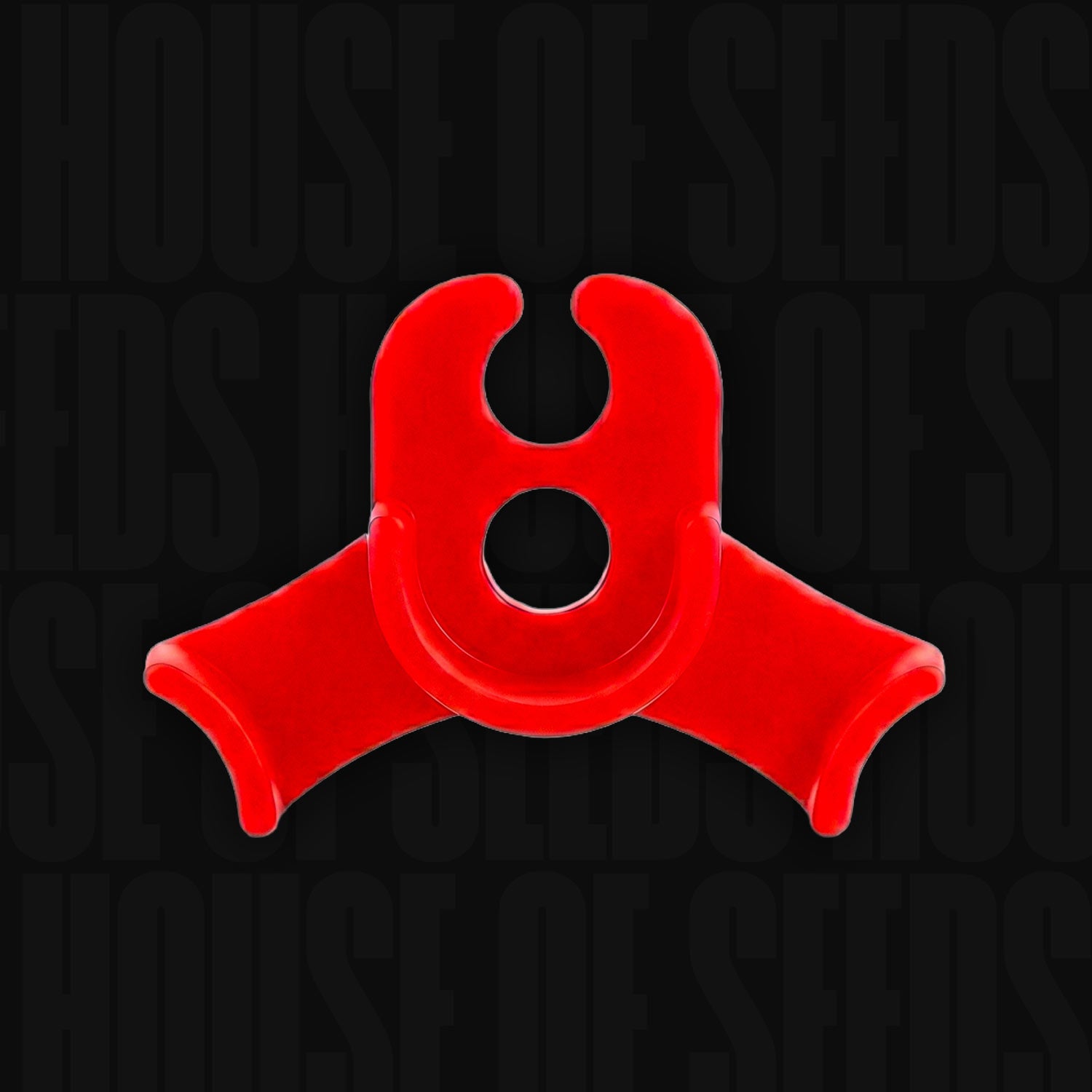 Der Holy Hemp LST Pflanzenbieger ist ein rotes, dreizackiges Kunststoffwerkzeug auf schwarzem Hintergrund.